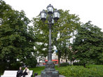 В сквере на Площади Островского — у памятника Екатерине Второй.