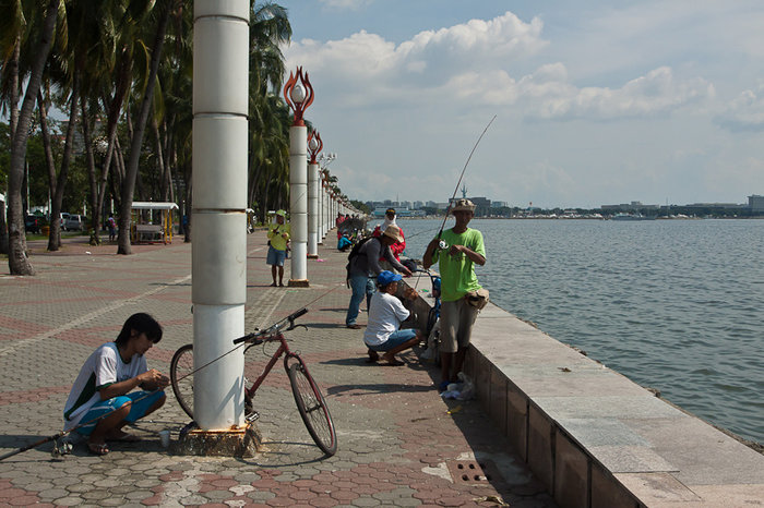 Рыбаки на море Манила, Филиппины