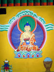 Будда на стене храма в эко-музее