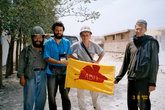 С.Браславский, А.Кротов, В.Шарлаев и К.Степанов
с флагом АВП недалеко от посольства РФ