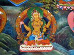Будда на стене храма