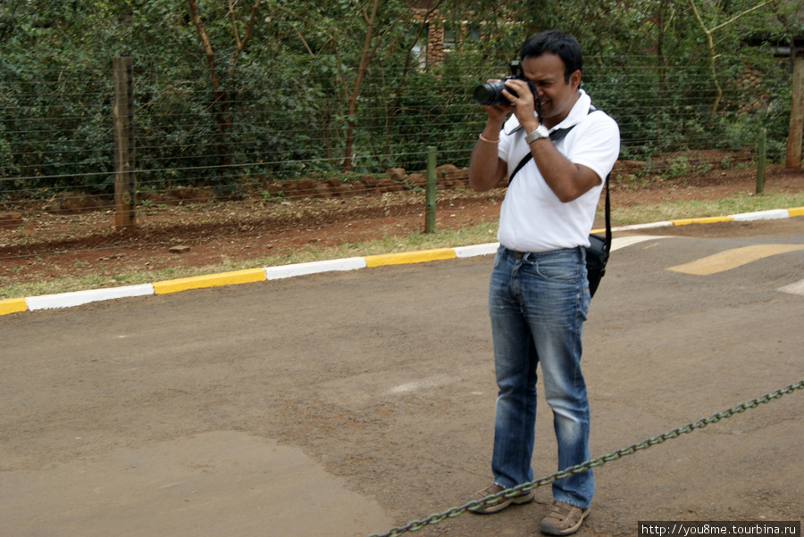 турист с фотоаппаратом ) Найроби, Кения